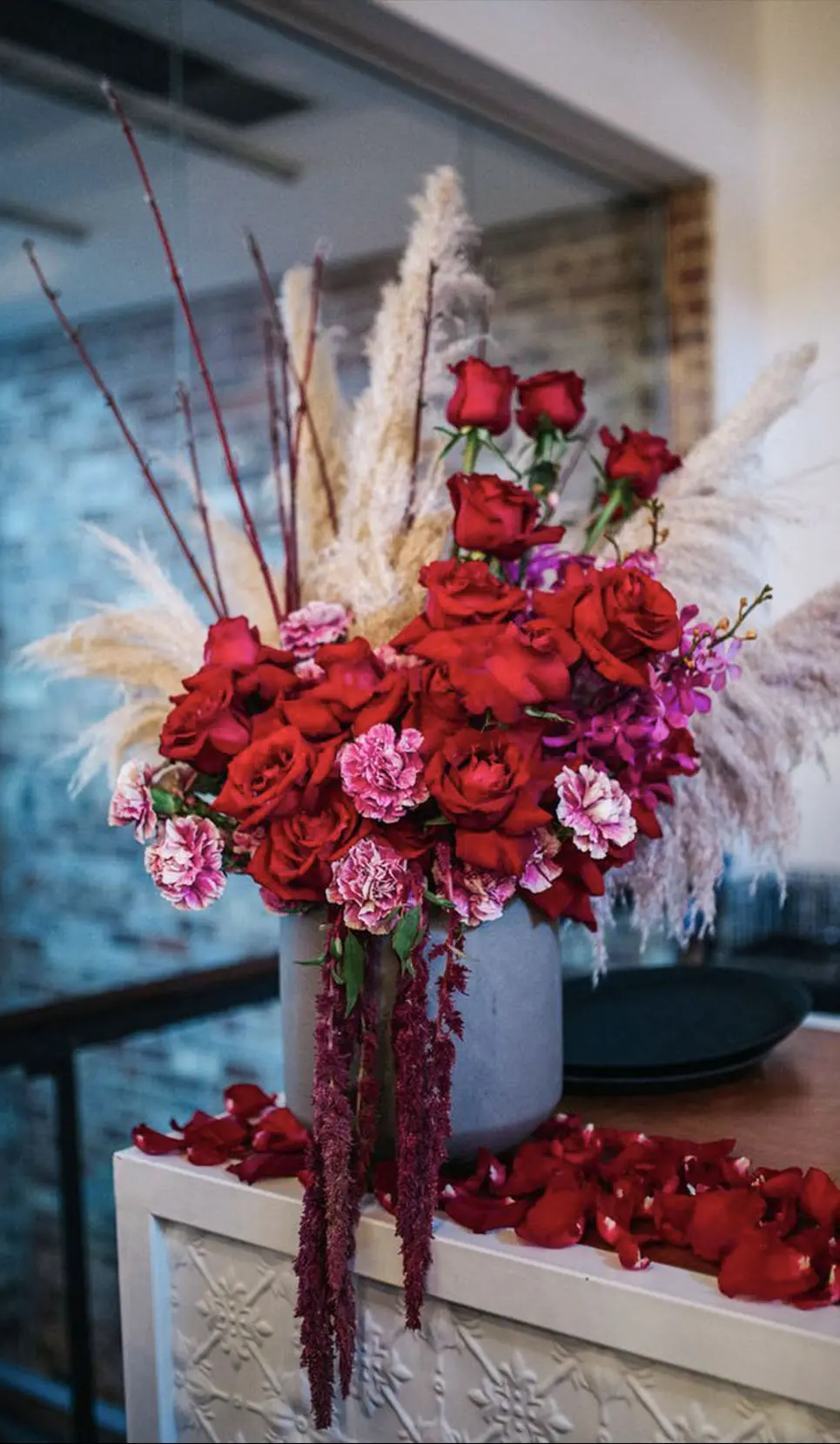 bunch of multicolor flowers roses in a glass vase